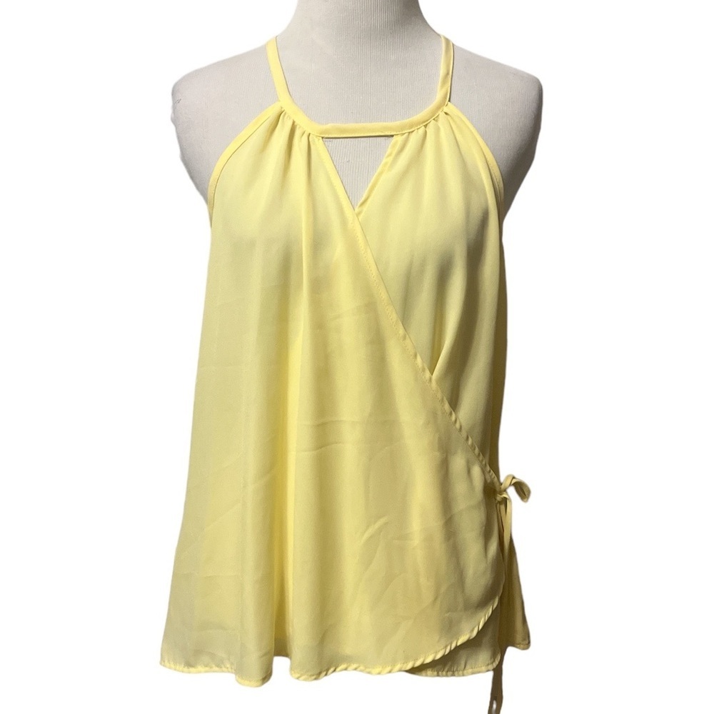 Yellow strappy top with cross over front and tie at the side, new without tags